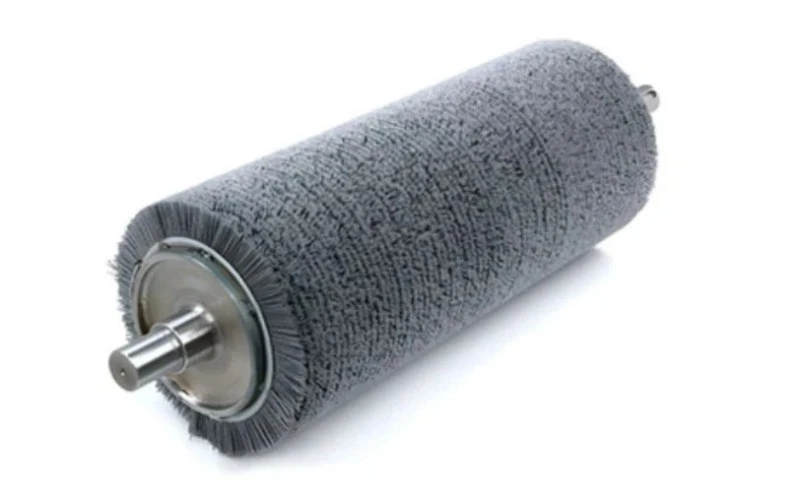 application of abrasive roller brush